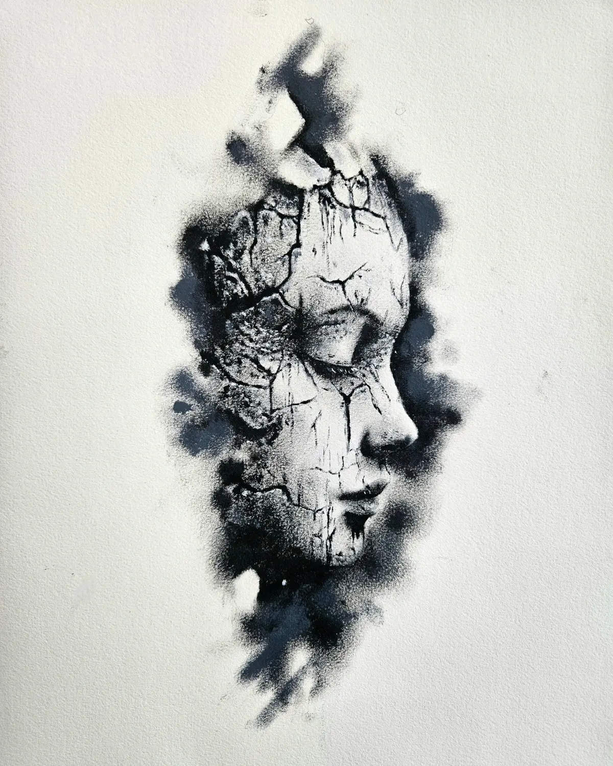 Cracked and fragmented female portrait